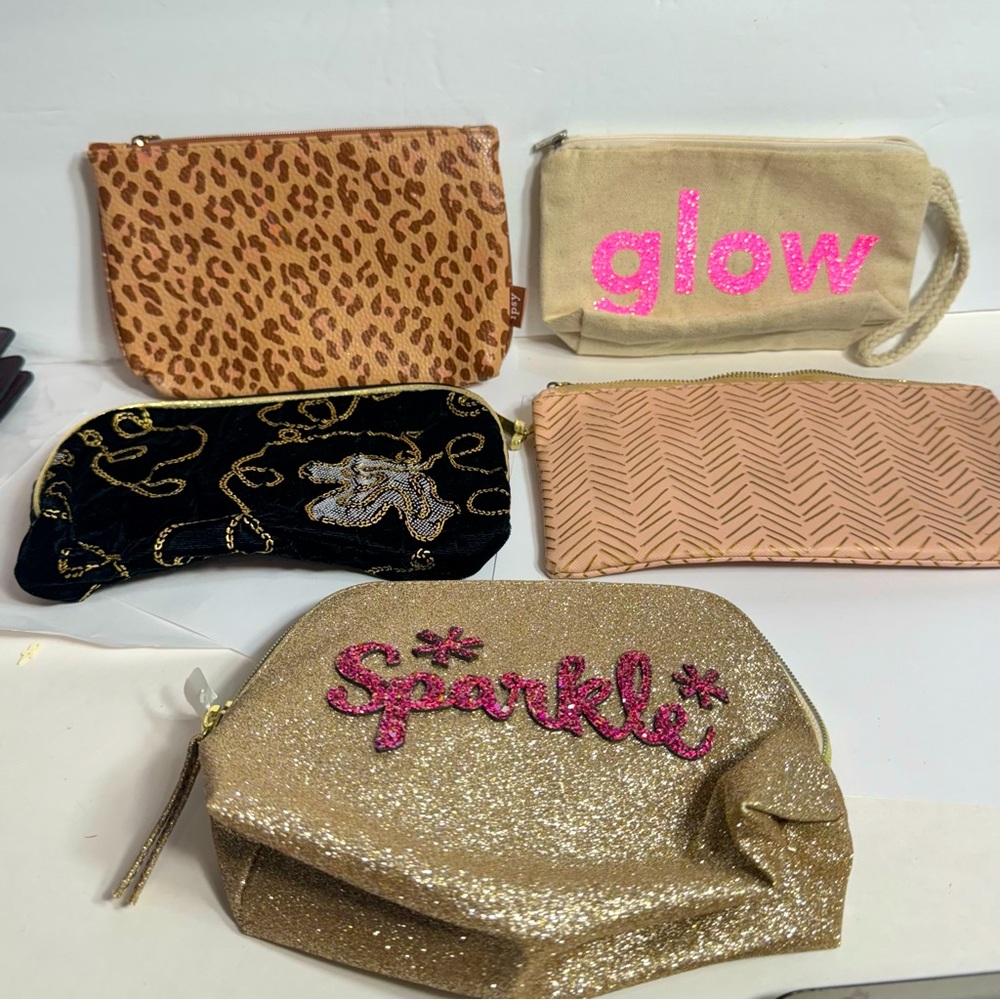 EUC. Set of 5 mini makeup zipper bags. Different brands. One  is NWT.